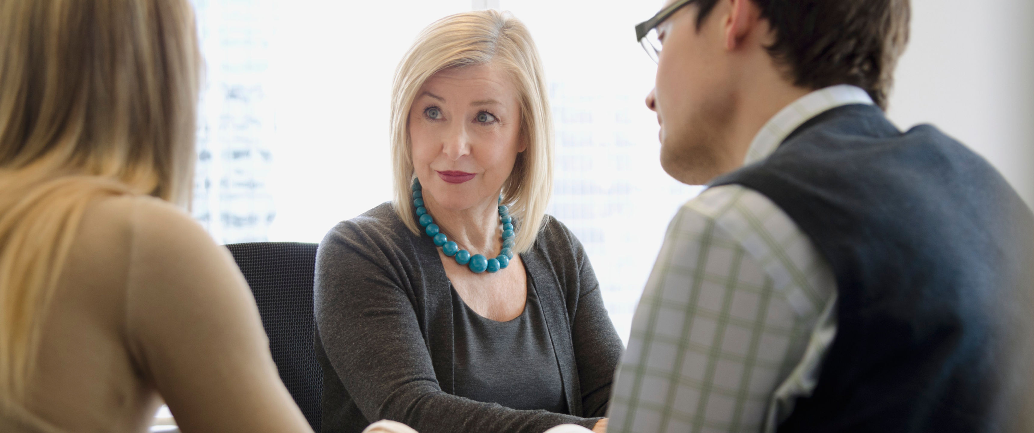 Young couple meeting with advisor